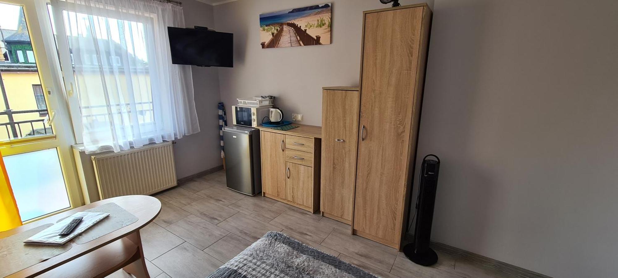 Moris 2 Pokoje Goscinne Leba Bilik gambar